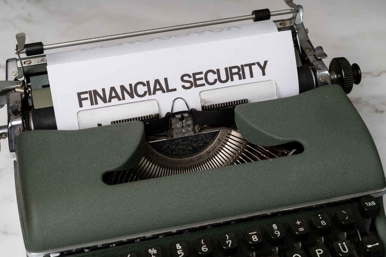 Crafting Captivating Headlines: Your awesome post title goes here Close-up of a vintage typewriter with 'Financial Security' typed on paper, representing financial themes.